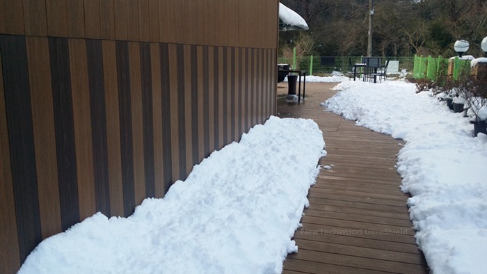 NewTechWood Composite Decking Covered with snow